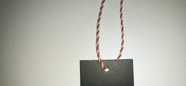 Hang tag string White & Red Twisted in yard